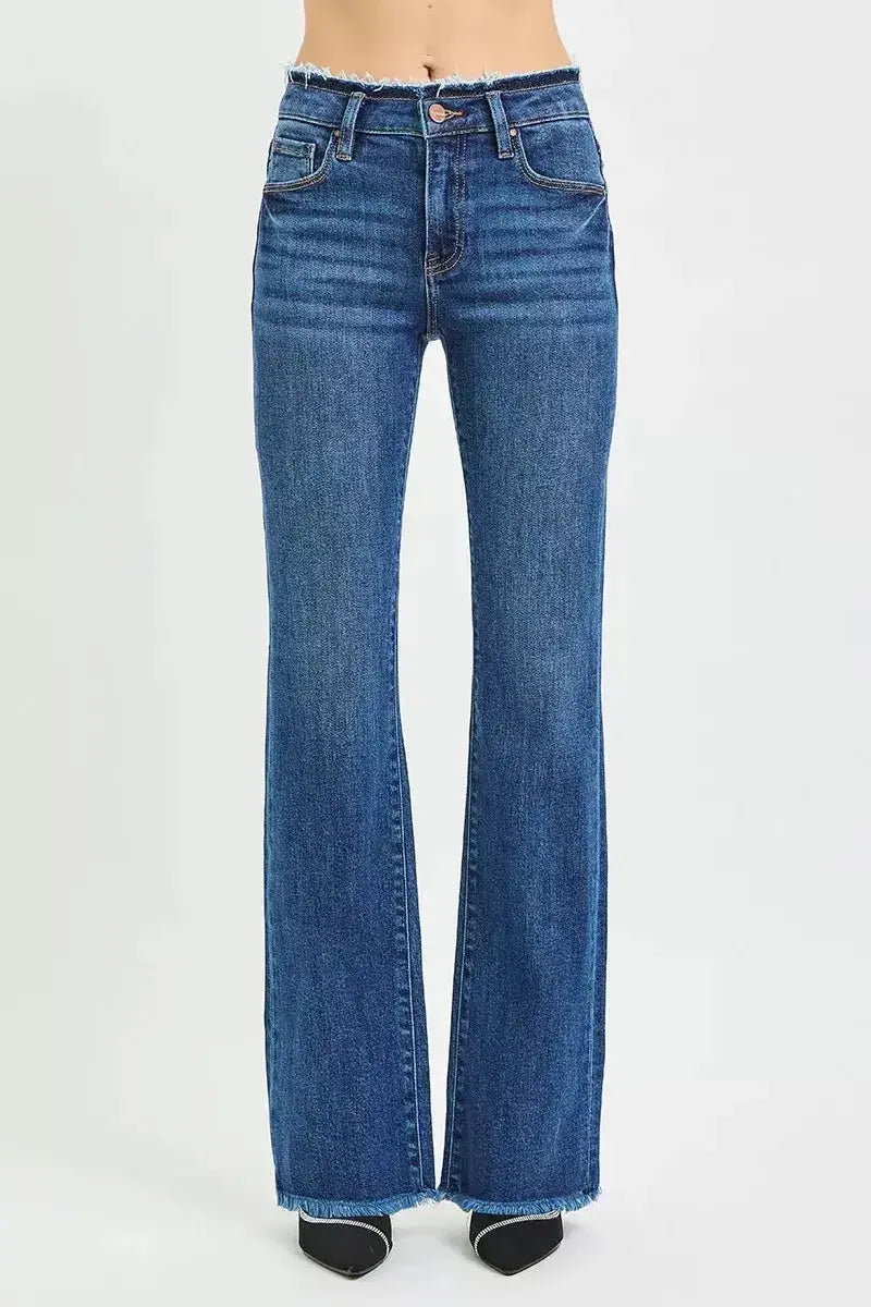 Mid-rise bootcut jeans with frayed waist and raw hem detail, stylish denim pants by Trendsi.