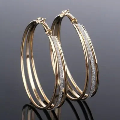 Modern multilayer forked circle earrings in gold and silver from Plush Fashion Hub, showcasing layered geometric design.