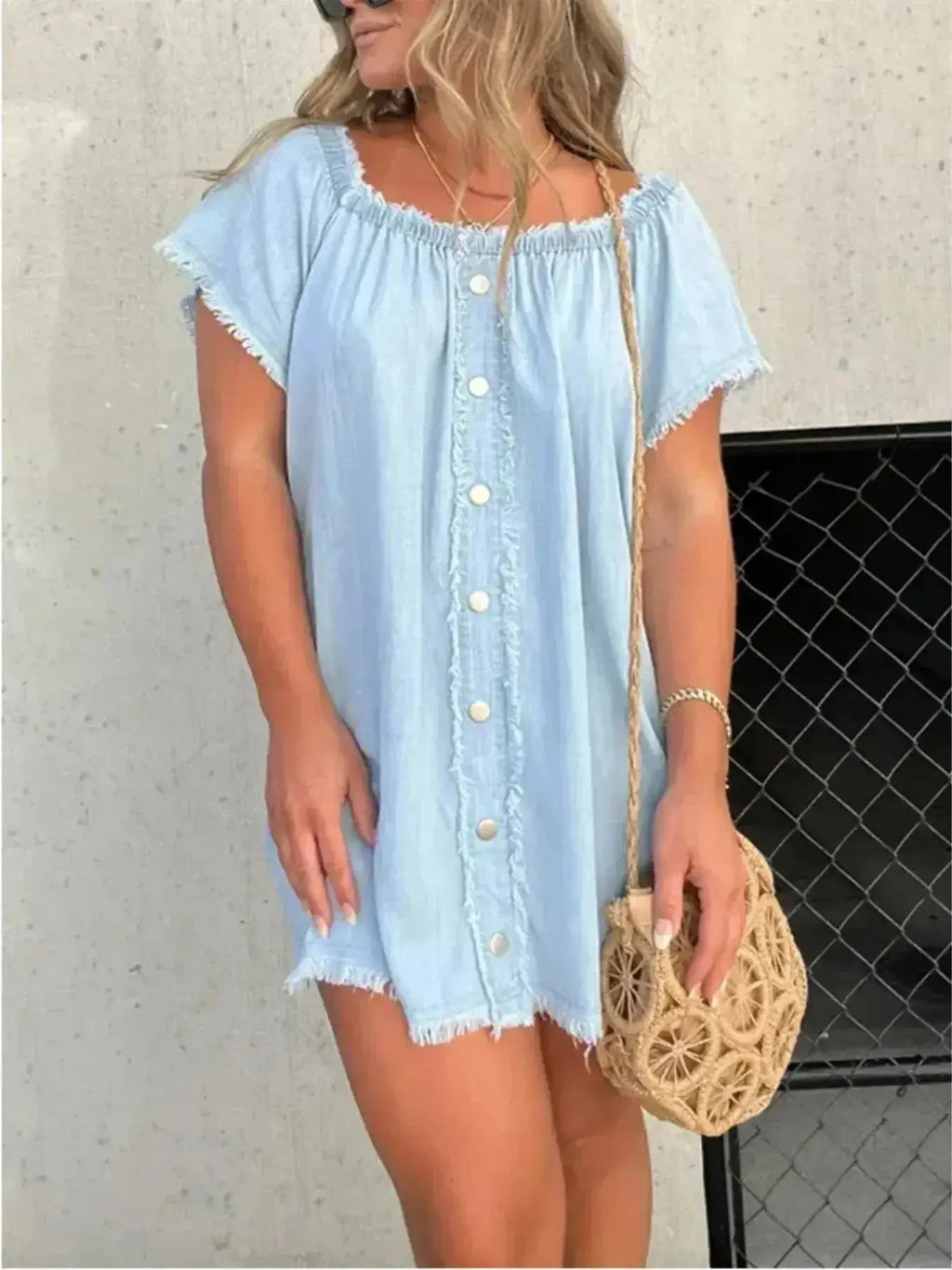 Plus size raw hem mini denim button-down dress by Trendsi, featuring a stretchy casual jean style with a relaxed fit.