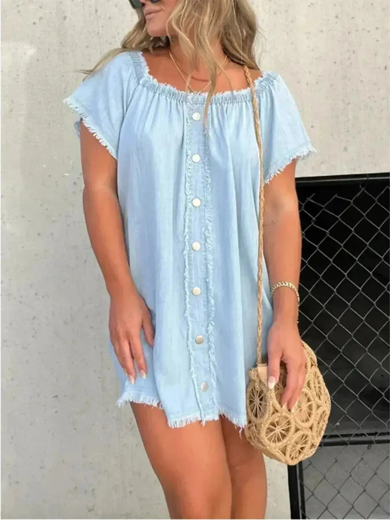 Plus size raw hem mini denim button-down dress by Trendsi, featuring a stretchy casual jean style with a relaxed fit.
