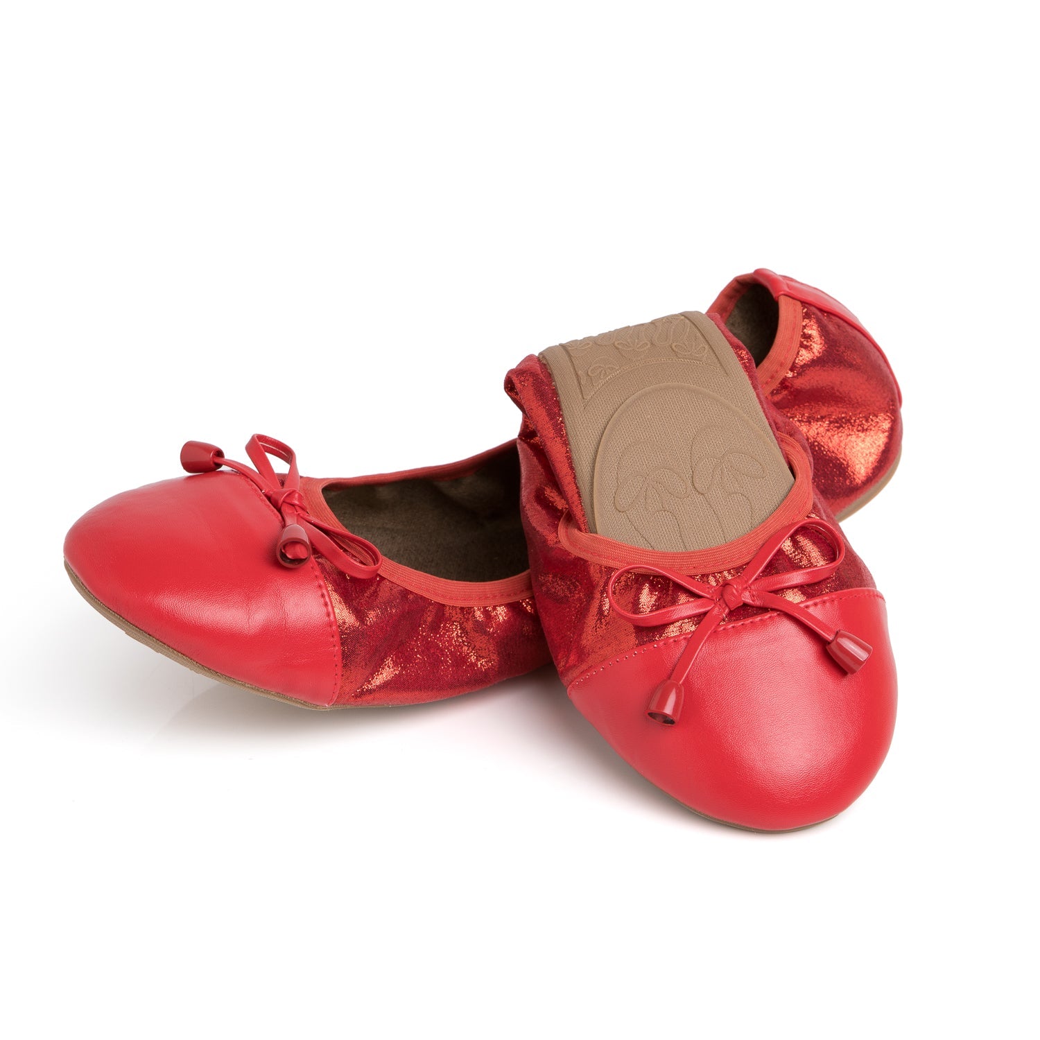 Pair of premium ruby red ballet flats with a metallic textured finish, rounded toes, and decorative ribbon bows.
