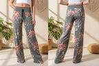 Charcoal grey wide-leg lounge pants with a pink floral print, featuring a drawstring waist and soft, relaxed fit.