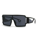 Women's oversized vintage square sunglasses with large rims and retro style, featuring trendy fashion eyewear from Plush Fashion Hub