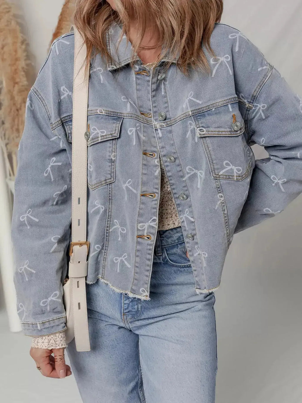 Bow Knot Print Light Wash Raw Hem Denim Jacket - Plush Fashion Hub