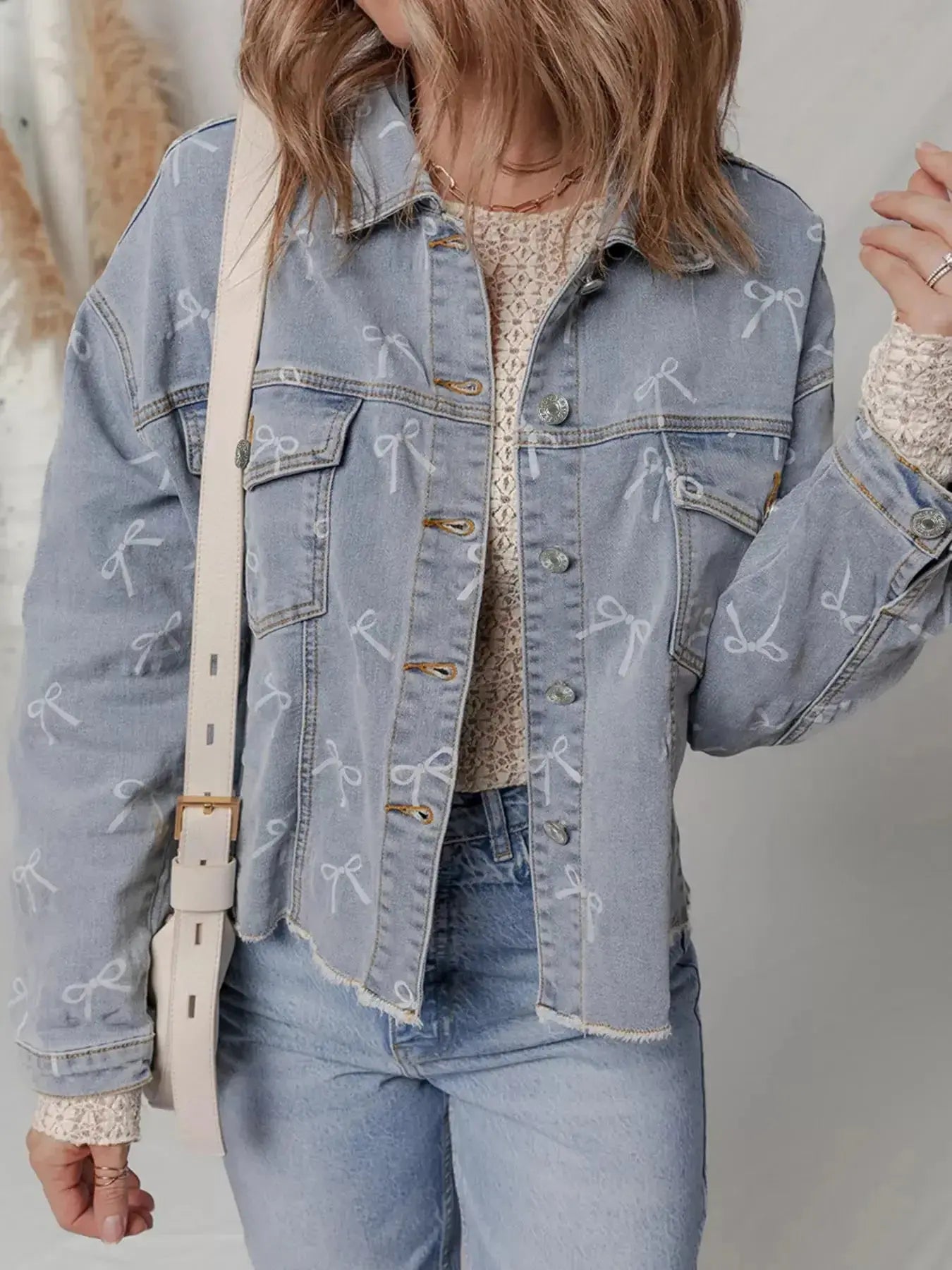 Bow Knot Print Light Wash Raw Hem Denim Jacket - Plush Fashion Hub