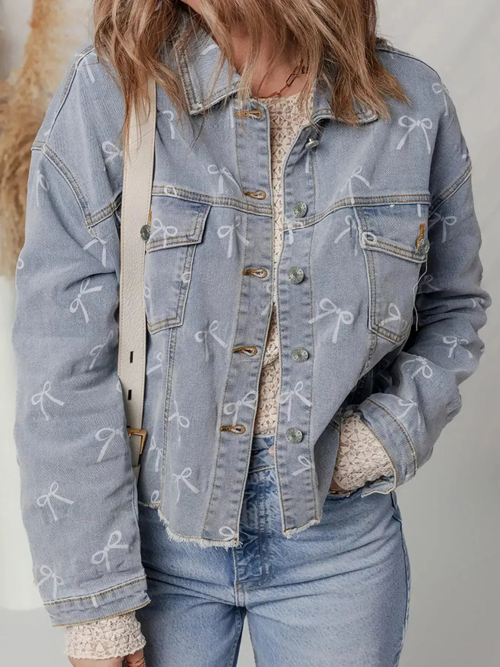 Bow Knot Print Light Wash Raw Hem Denim Jacket - Plush Fashion Hub