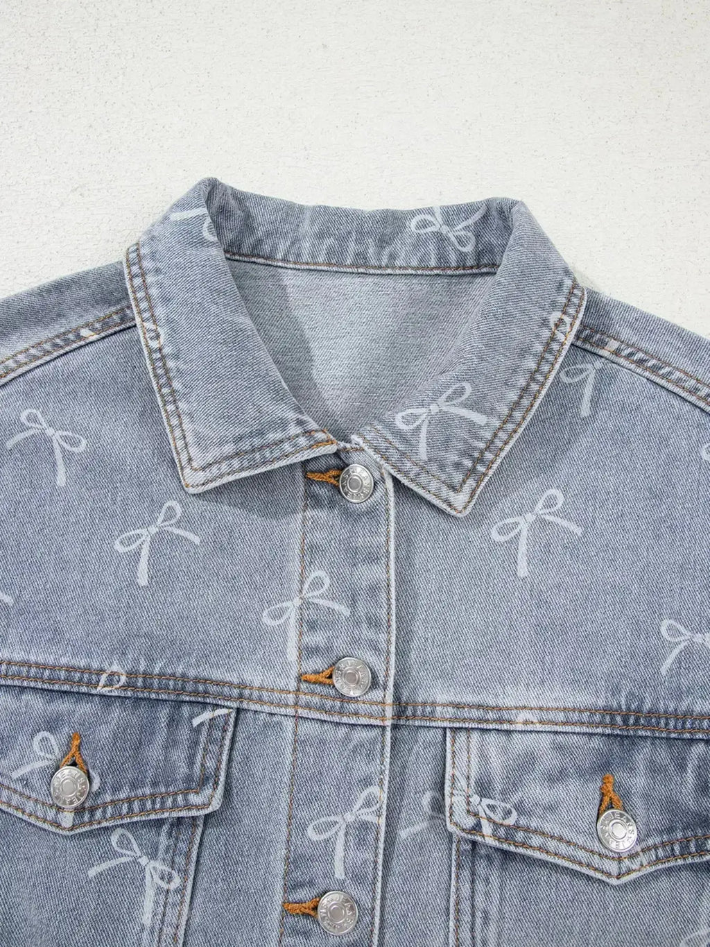 Bow Knot Print Light Wash Raw Hem Denim Jacket - Plush Fashion Hub