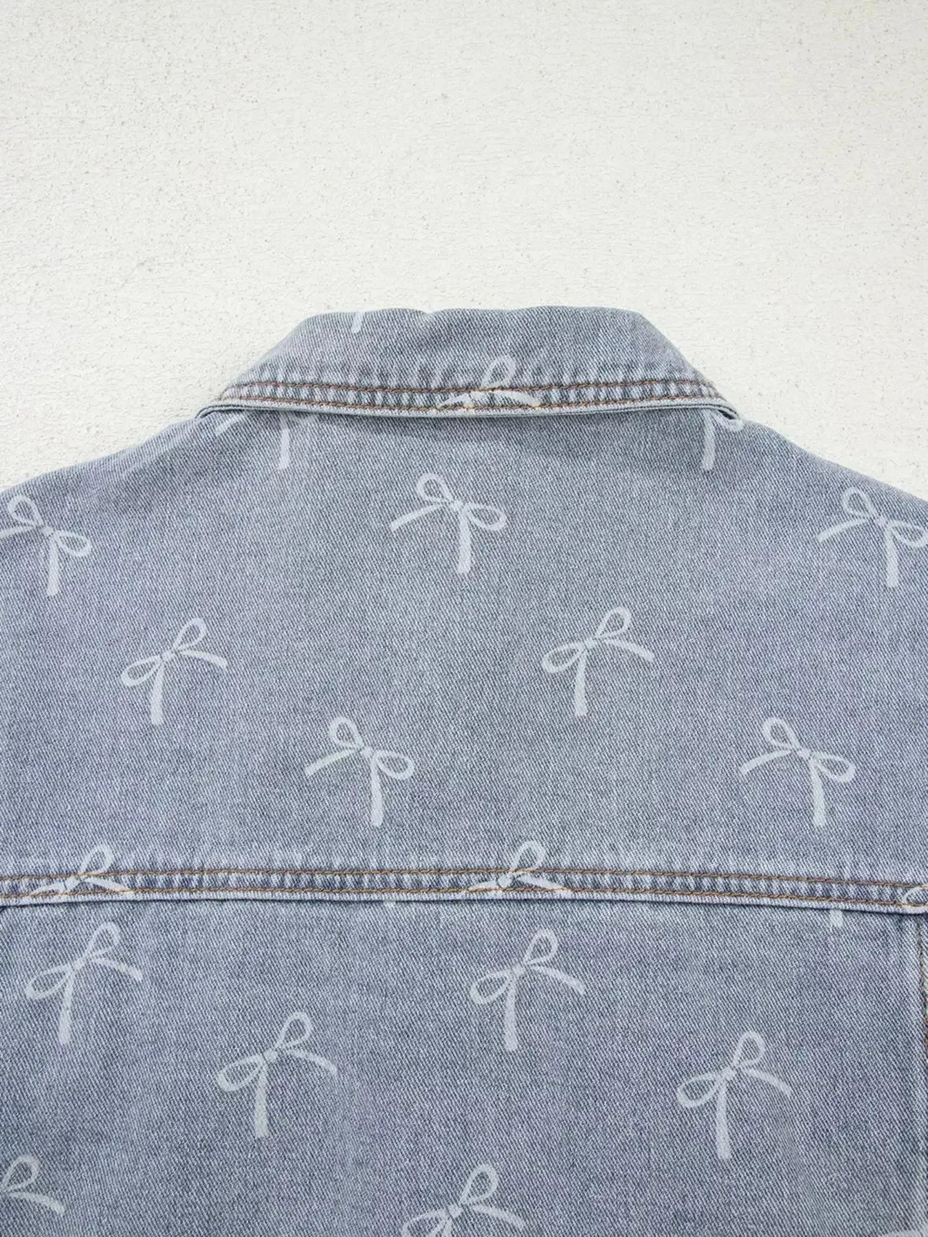Bow Knot Print Light Wash Raw Hem Denim Jacket - Plush Fashion Hub