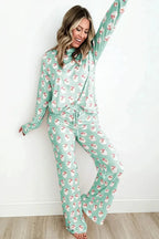 Women's festive Santa print long sleeve pajama lounge set by Trendsi, featuring cozy red and white holiday-themed pajamas.