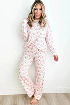 Women's festive Santa print long sleeve pajama lounge set by Trendsi, featuring cozy red and white holiday-themed pajamas.
