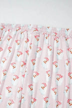 Women’s festive Santa print long sleeve pajama lounge set by Trendsi, featuring cozy holiday-themed pajamas for women.