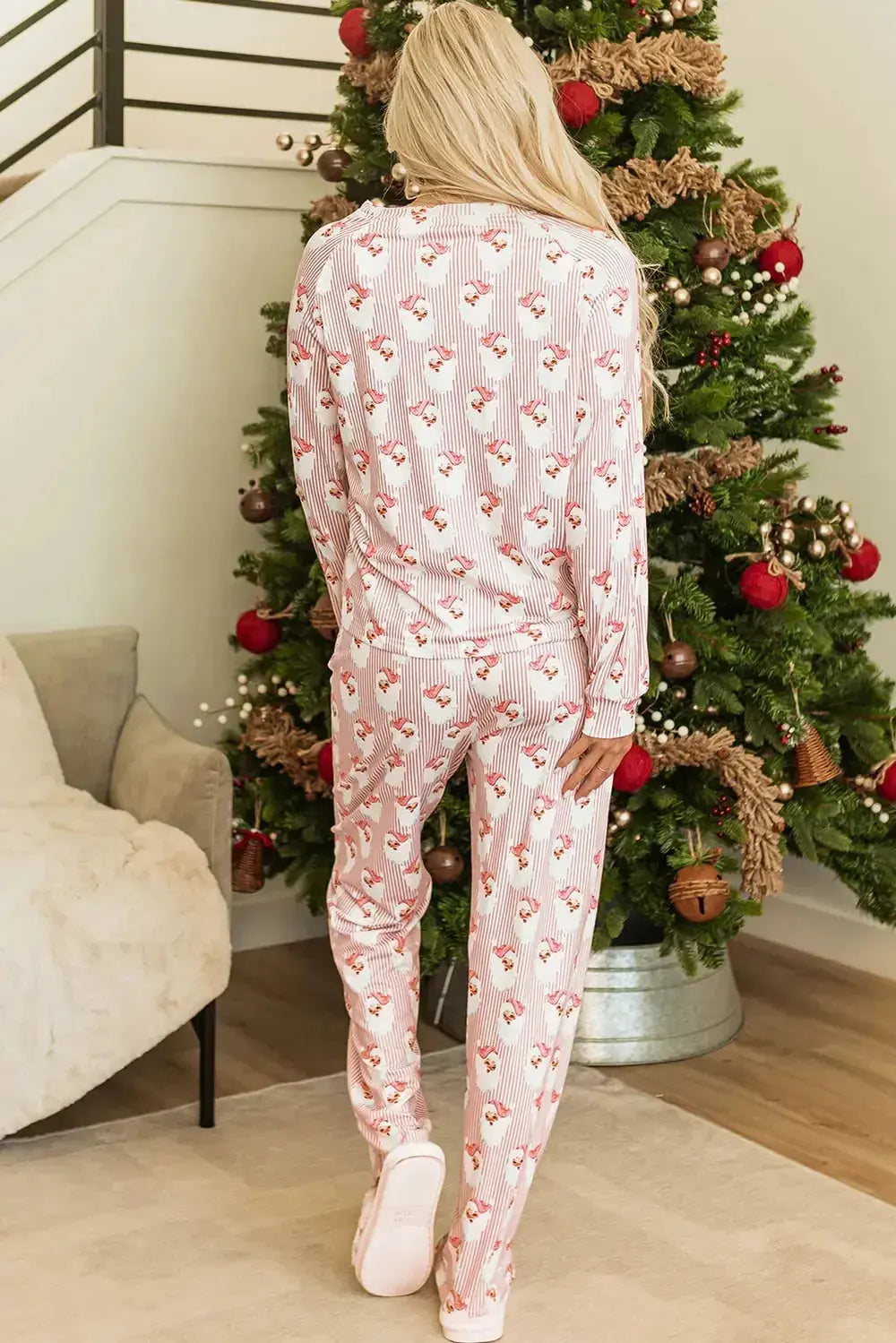 Women’s festive Santa print long sleeve pajama lounge set by Trendsi, featuring cozy holiday-themed pajamas for women.