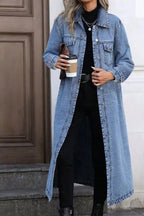 Women’s longline denim jacket by Trendsi featuring oversized fit, button-down front, and utility style in classic blue denim fabric.