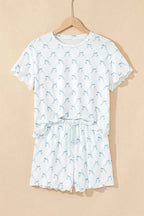 Women's printed round neck lounge set by Trendsi, soft pajama top and shorts for comfortable relaxed wear.