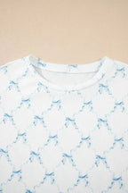 Women’s printed round neck lounge set with soft pajama top and shorts, comfortable sleepwear by Trendsi.