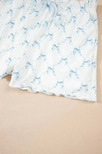 Women’s printed round neck lounge set by Trendsi featuring a soft pajama top and matching shorts for comfortable sleepwear.