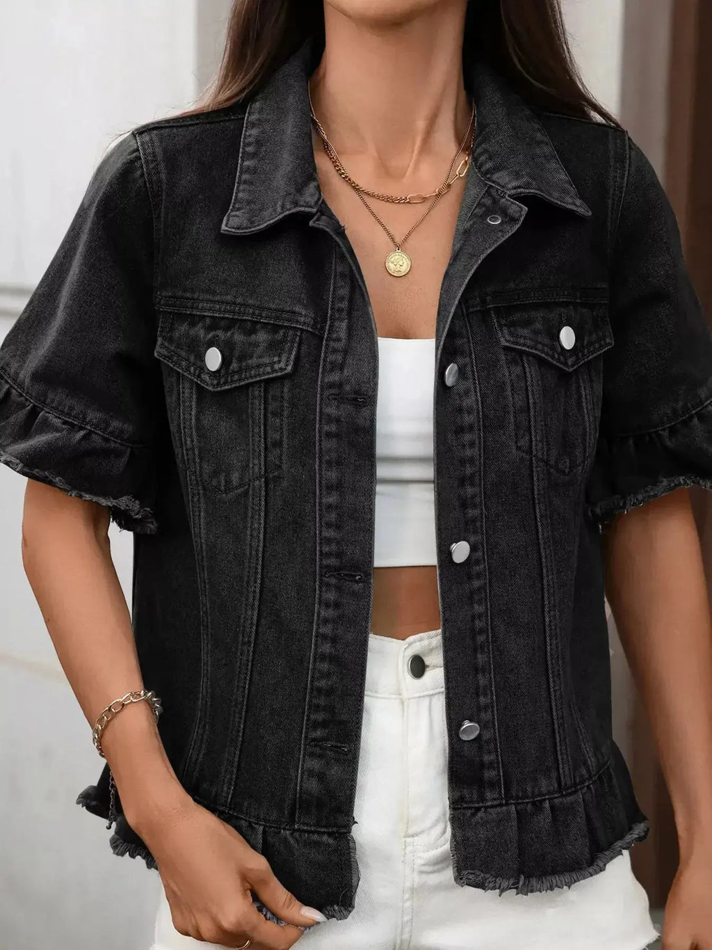 Women’s raw hem ruffled denim jacket by Trendsi, featuring a stylish button-up design and trendy distressed details.