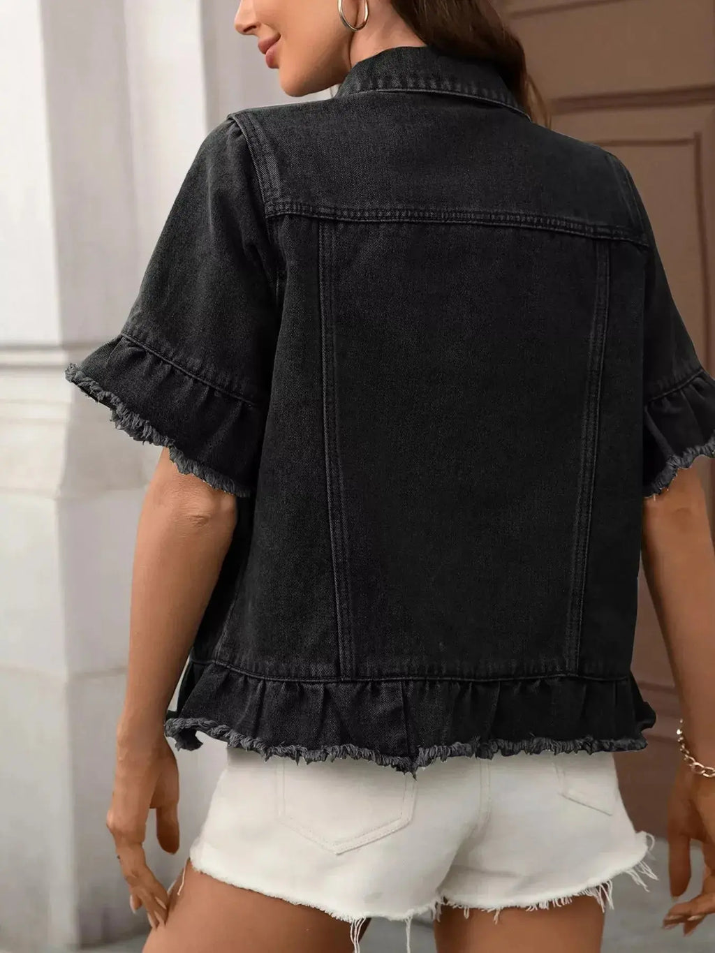Women’s raw hem ruffled denim jacket by Trendsi featuring stylish button-up design and classic jean jacket style.