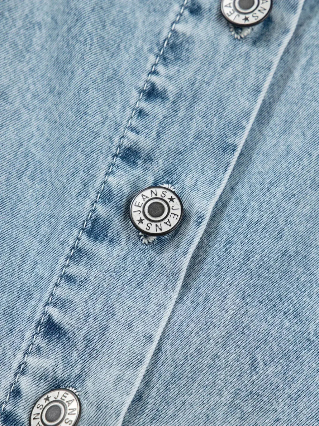 Women’s tiered flowy denim overall dress with raw hem, made from 100% cotton, by Trendsi, featuring a relaxed fit and casual style.