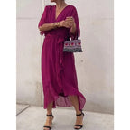 Plush Fashion Hub batwing sleeve v-neck midi dress with tied irregular hem, airy fairy dress style, shown on a model.