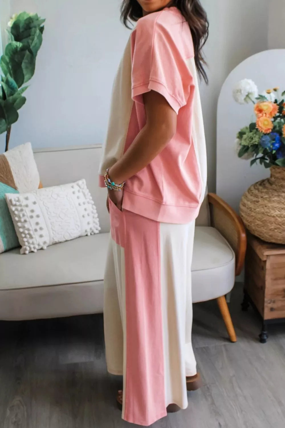 Two-tone color block patchwork tee and drawstring loose pants set by Trendsi, casual fashion ensemble with vibrant fabric details.