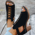 Women's faux leather buckle block heel sandals with mid-height heels, featuring a stylish strap design and comfortable fit.