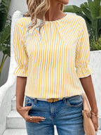 Women's striped ruffled round neck half sleeve blouse from Trendsi, featuring a stylish design and comfortable fit.