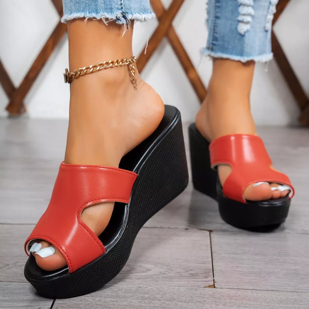 Open toe wedge sandals by Plush Fashion Hub featuring stylish straps and a comfortable platform sole.