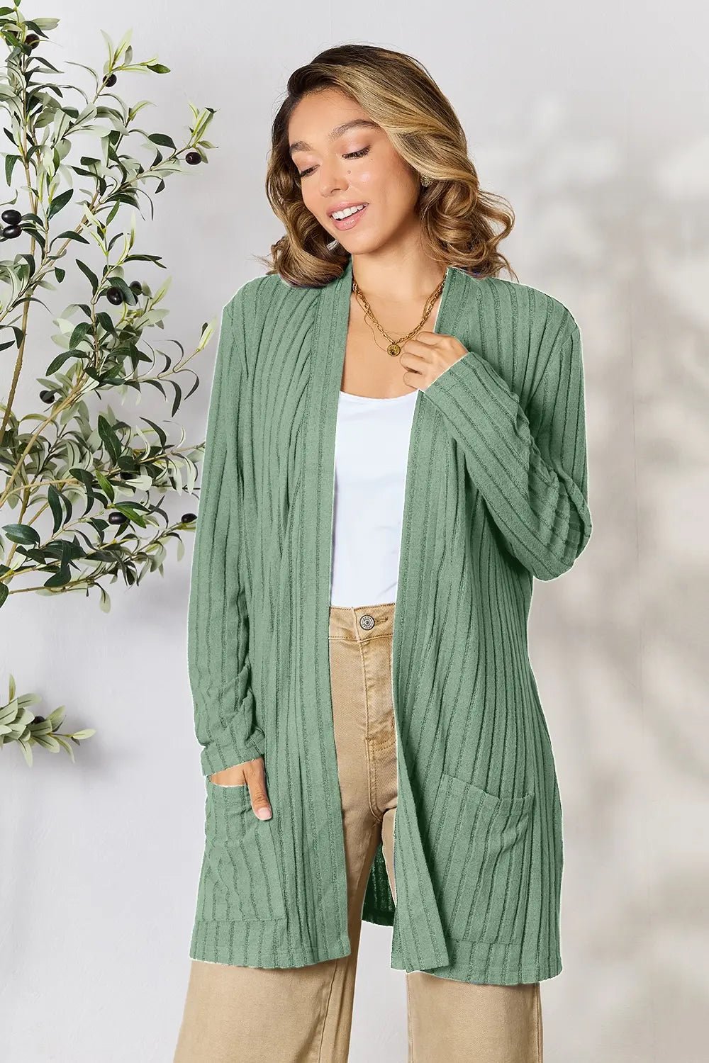 Women's ribbed open front cardigan with functional pockets, lightweight and cozy, perfect for casual layered outfits.