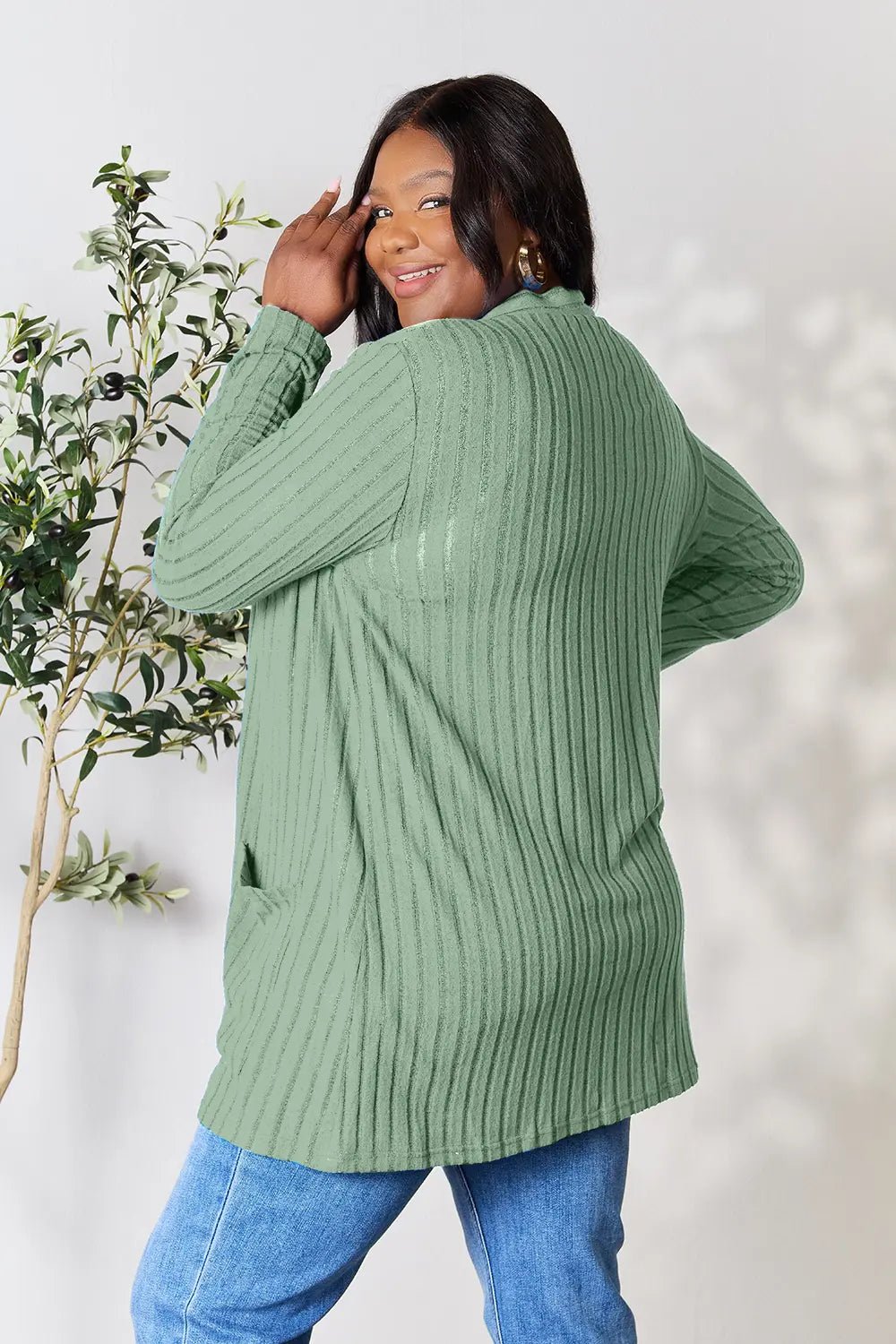 Women’s lightweight ribbed open front cardigan with functional pockets, stylish and cozy for casual wear.