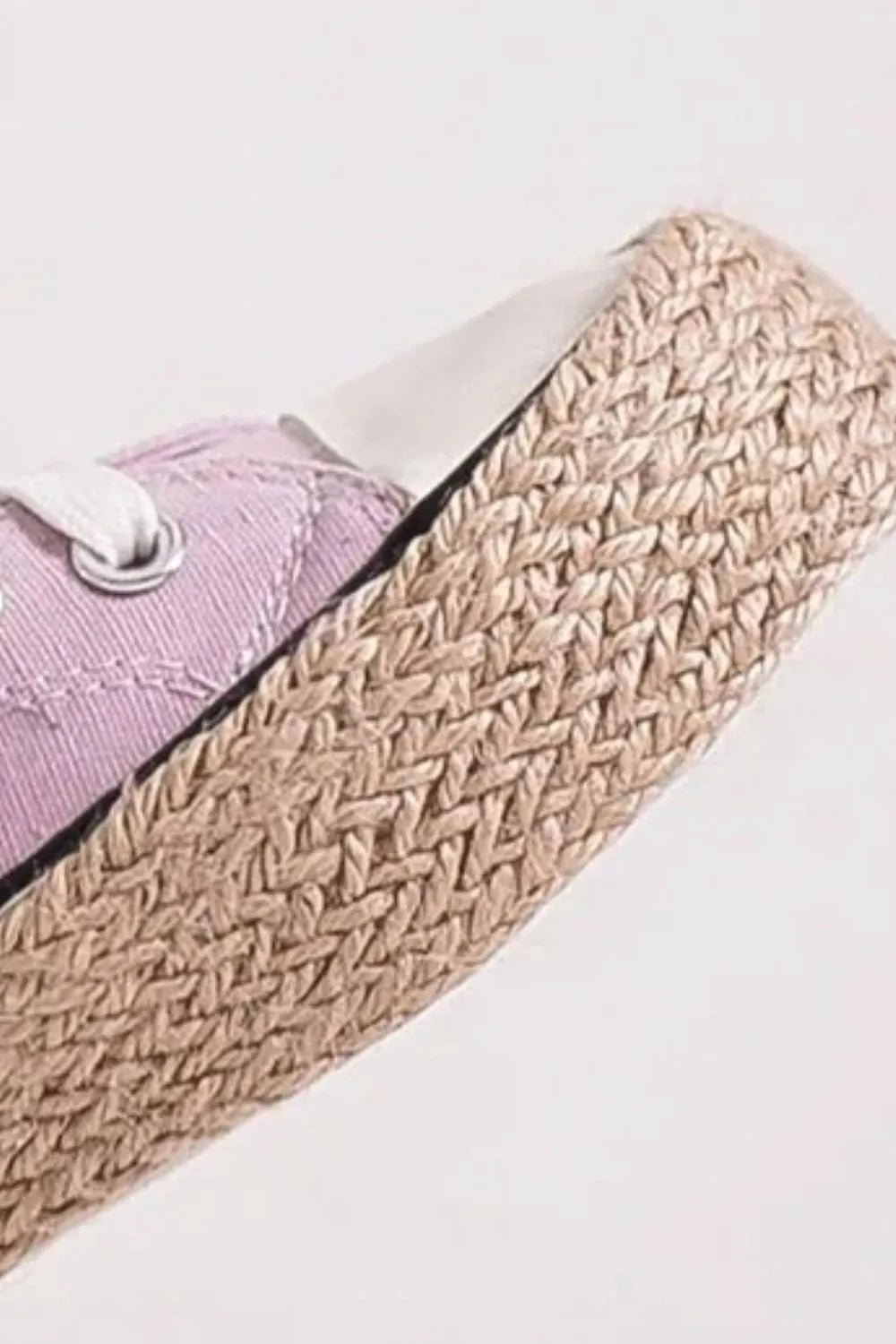 Women's lace-up woven espadrille canvas sneakers with breathable summer design and flat sole, ideal for casual warm-weather wear.