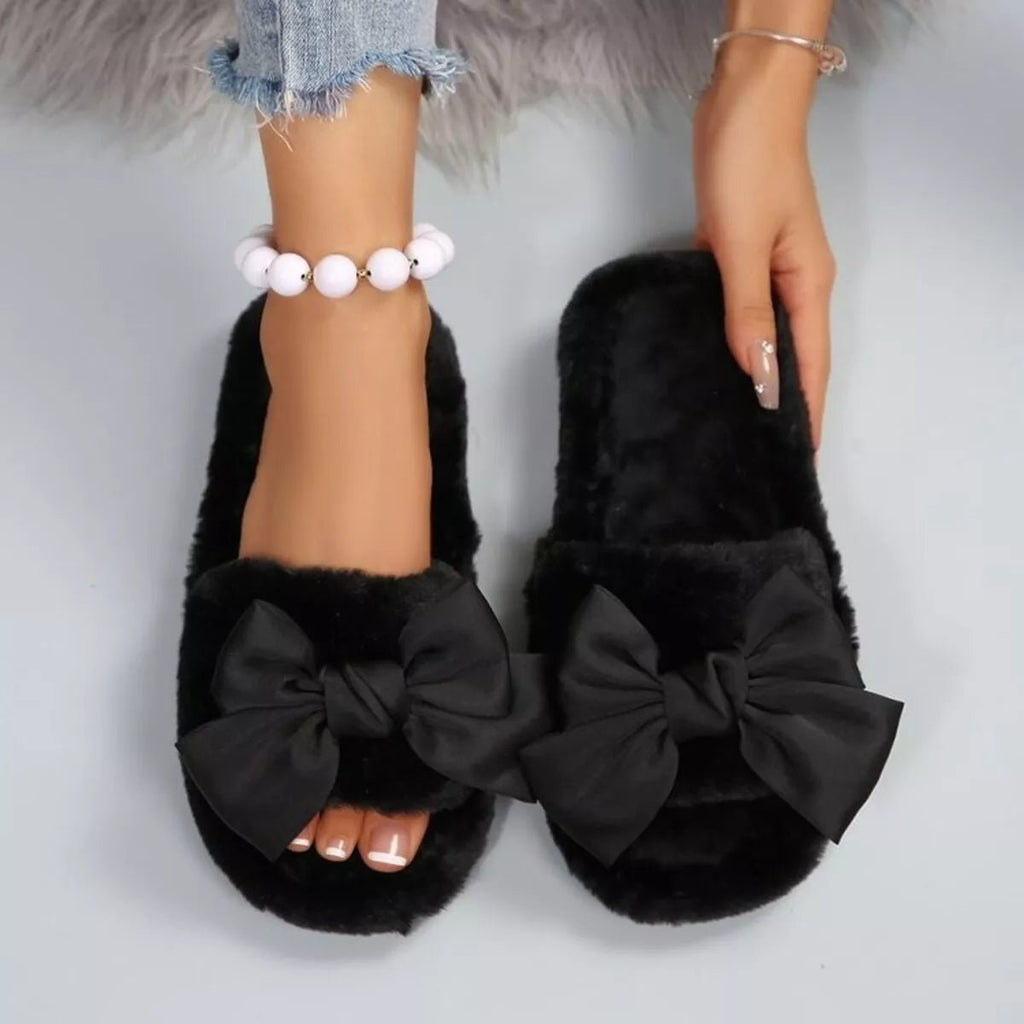 Women's chic faux leather bow open toe flat slippers, stylish slip-on shoes by Trendsi with a decorative bow detail.