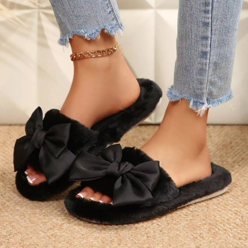 Women's chic faux leather bow open-toe flats slippers with a stylish design, perfect for casual or dressy occasions.