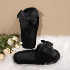 Women's chic faux leather bow open-toe flat slippers with a stylish design and comfortable slip-on style.