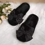 Women's chic faux leather bow open toe flat slippers with stylish design, perfect for casual and comfortable wear.