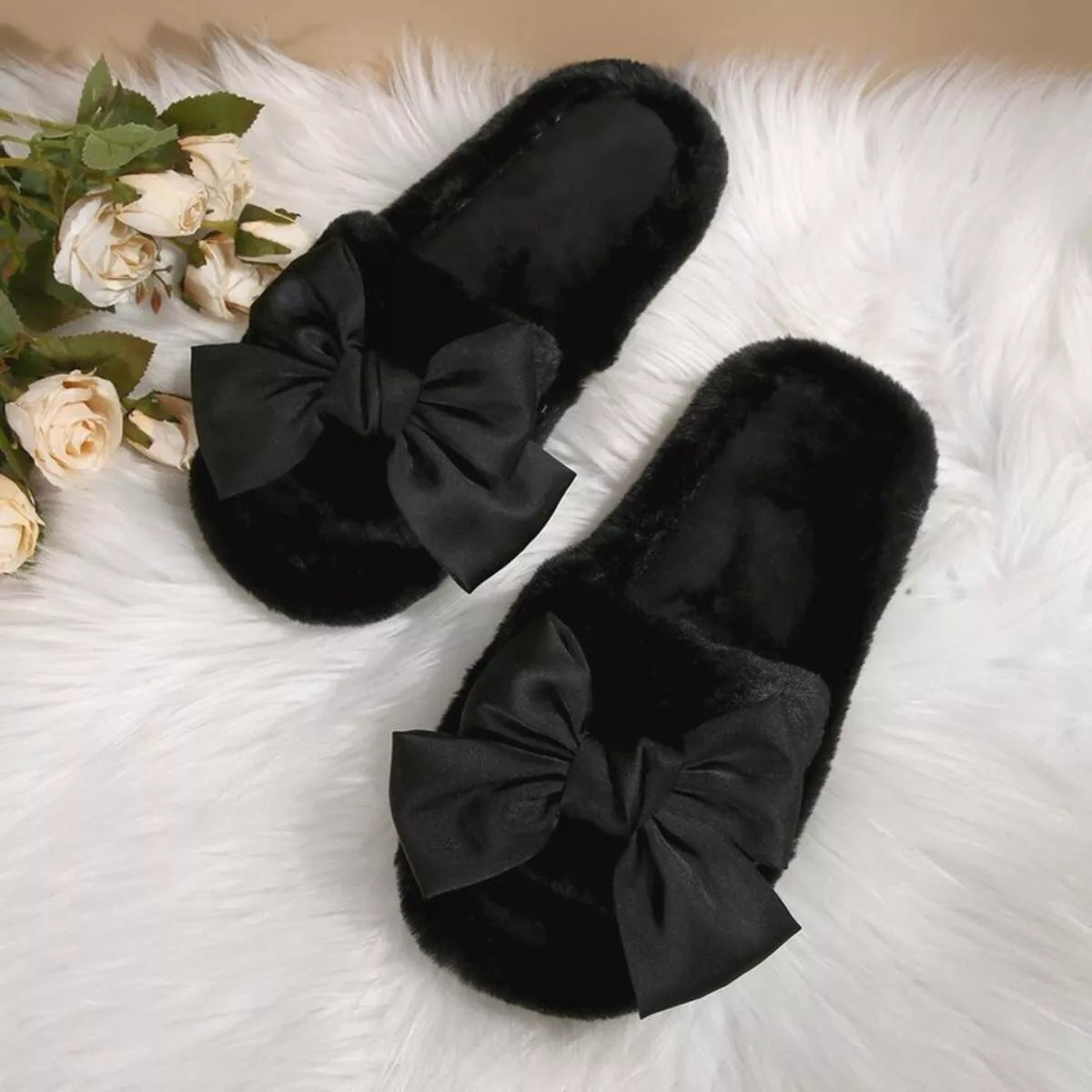 Women's chic faux leather bow open toe flat slippers with stylish design, perfect for casual and comfortable wear.