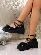 Women's round toe block heel pumps with bow detail, stylish mid-heel shoes by Trendsi.