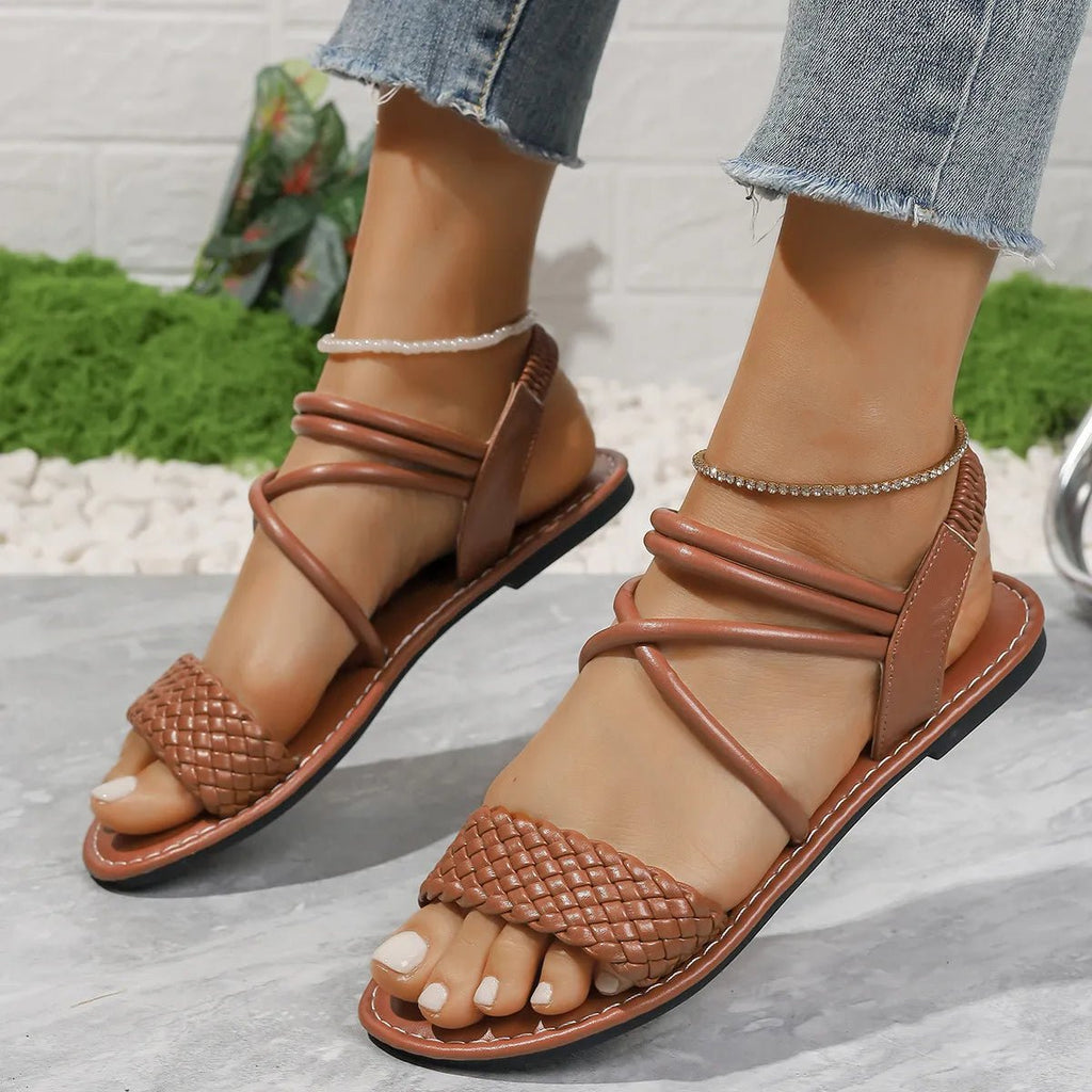 Braided ankle strap flat sandals by Trendsi, featuring comfortable PU leather and casual summer style.