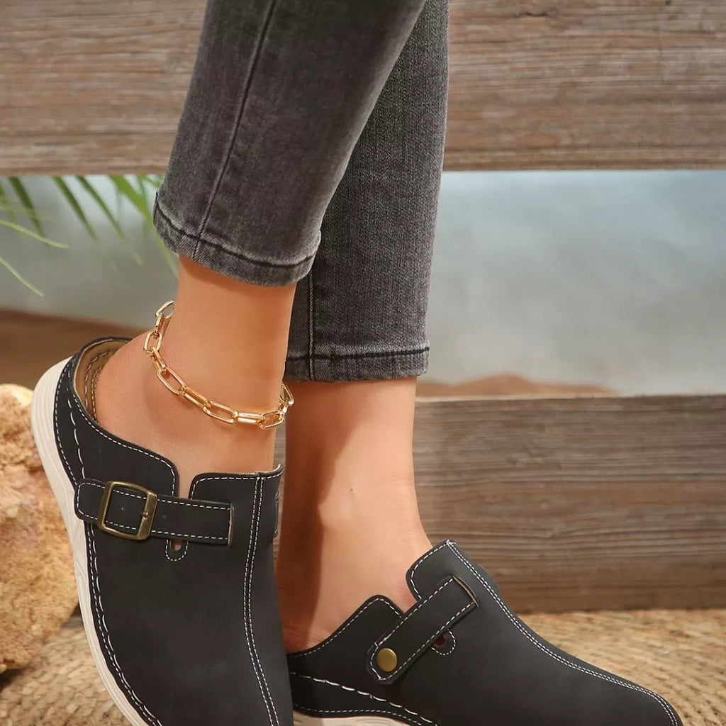 Women's slip-on flats with buckle accents in premium PU leather, stylish and comfortable shoes by Trendsi.