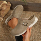 Women's slip-on flats with buckle accents in premium PU leather, stylish and comfortable shoes by Trendsi.