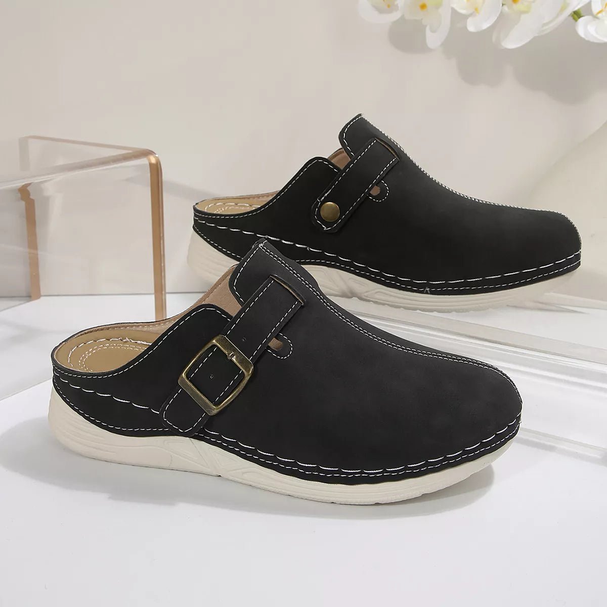 Women's slip-on flats with buckle accents in premium PU leather, stylish and comfortable shoes by Trendsi.