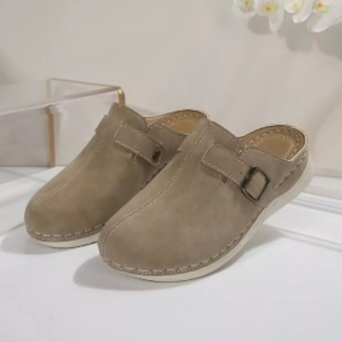 Women's slip-on flats with chic buckle accents in premium PU leather, stylish and comfortable footwear by Trendsi.