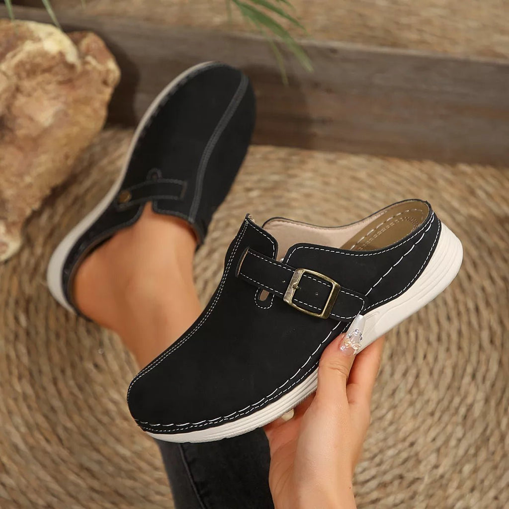 Women's slip-on flats with buckle accent in premium PU leather, stylish and comfortable shoes by Trendsi.