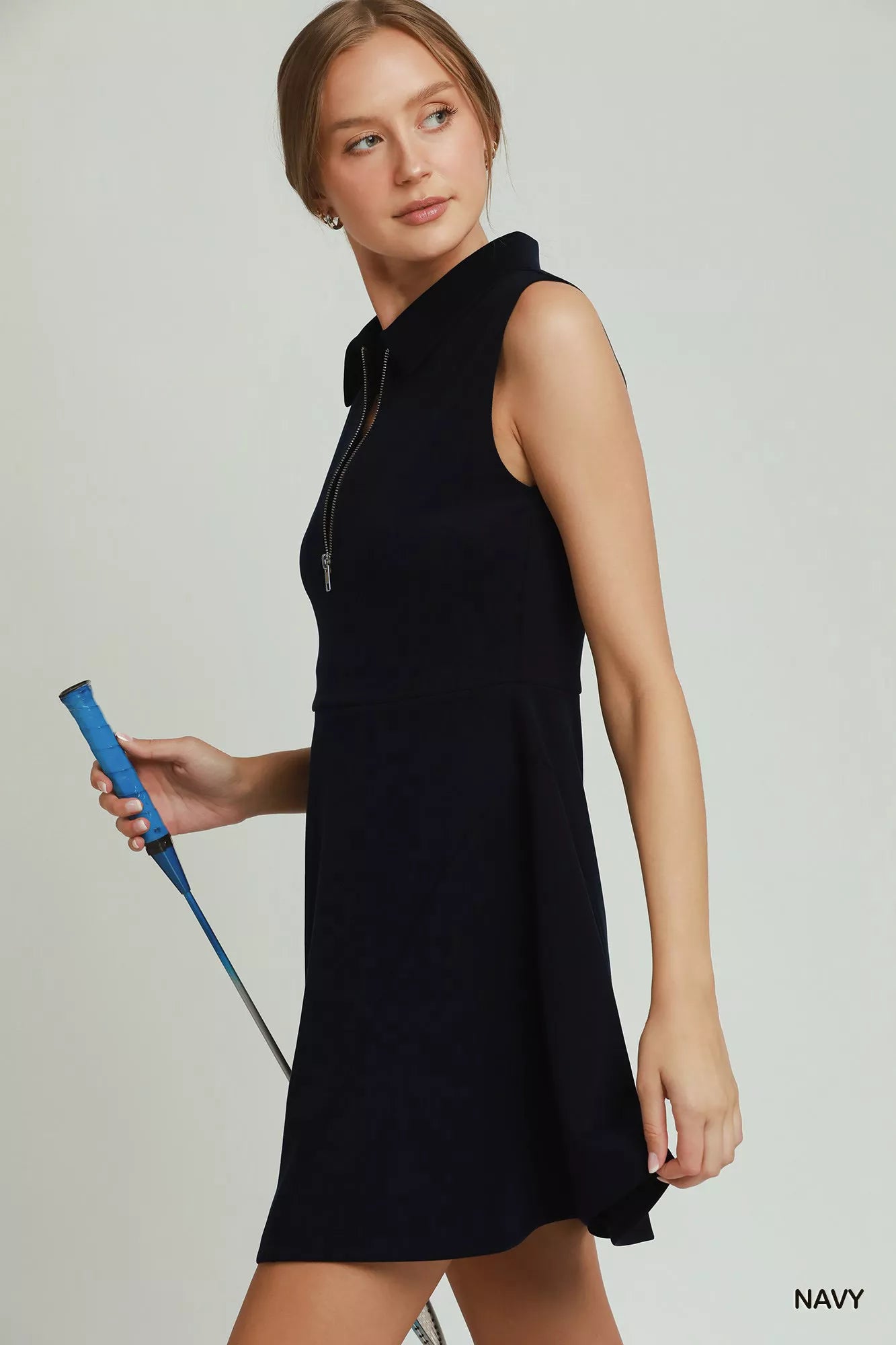 Umgee collared quarter zip tennis dress by Trendsi, stylish dress with a collared neckline and quarter zip detail, perfect for activewear.