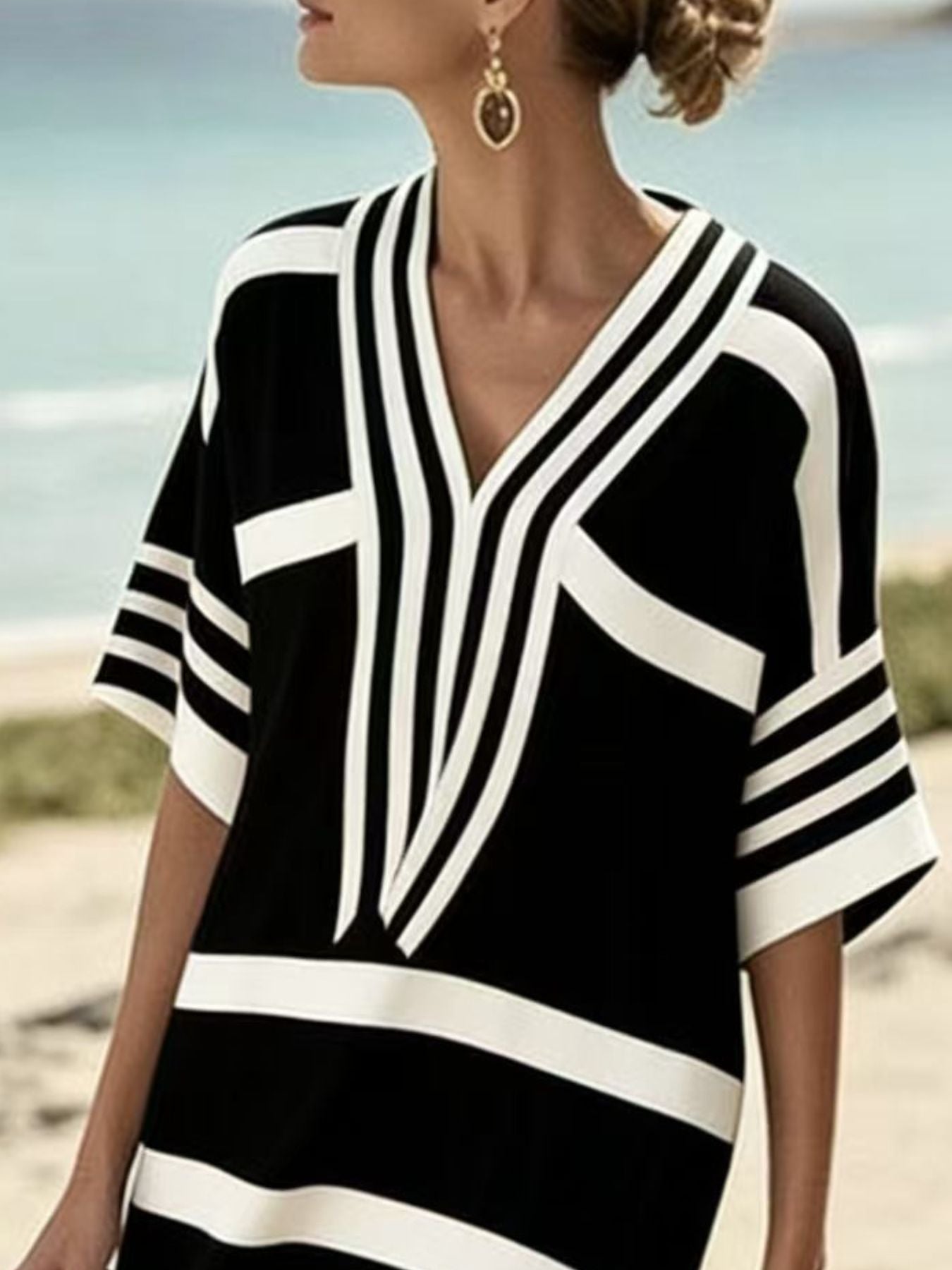 Plus size women's striped midi dress with half-sleeves, casual chic style, featuring a relaxed fit and stylish design.