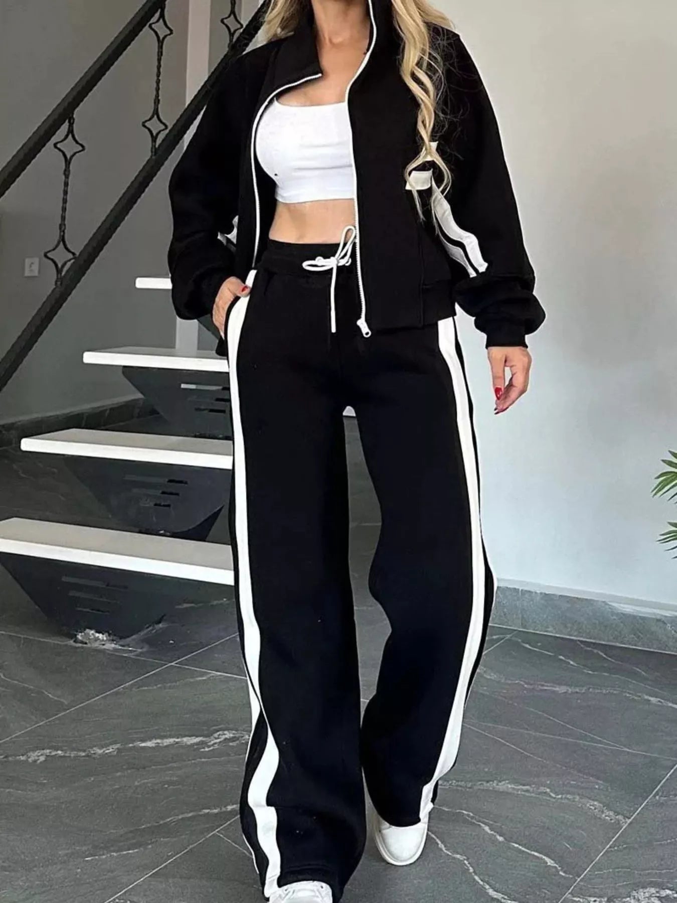 Plus size contrast stripe zip-up activewear jacket and pants set by Plush Fashion Hub, featuring bold stripe details and comfortable fit.