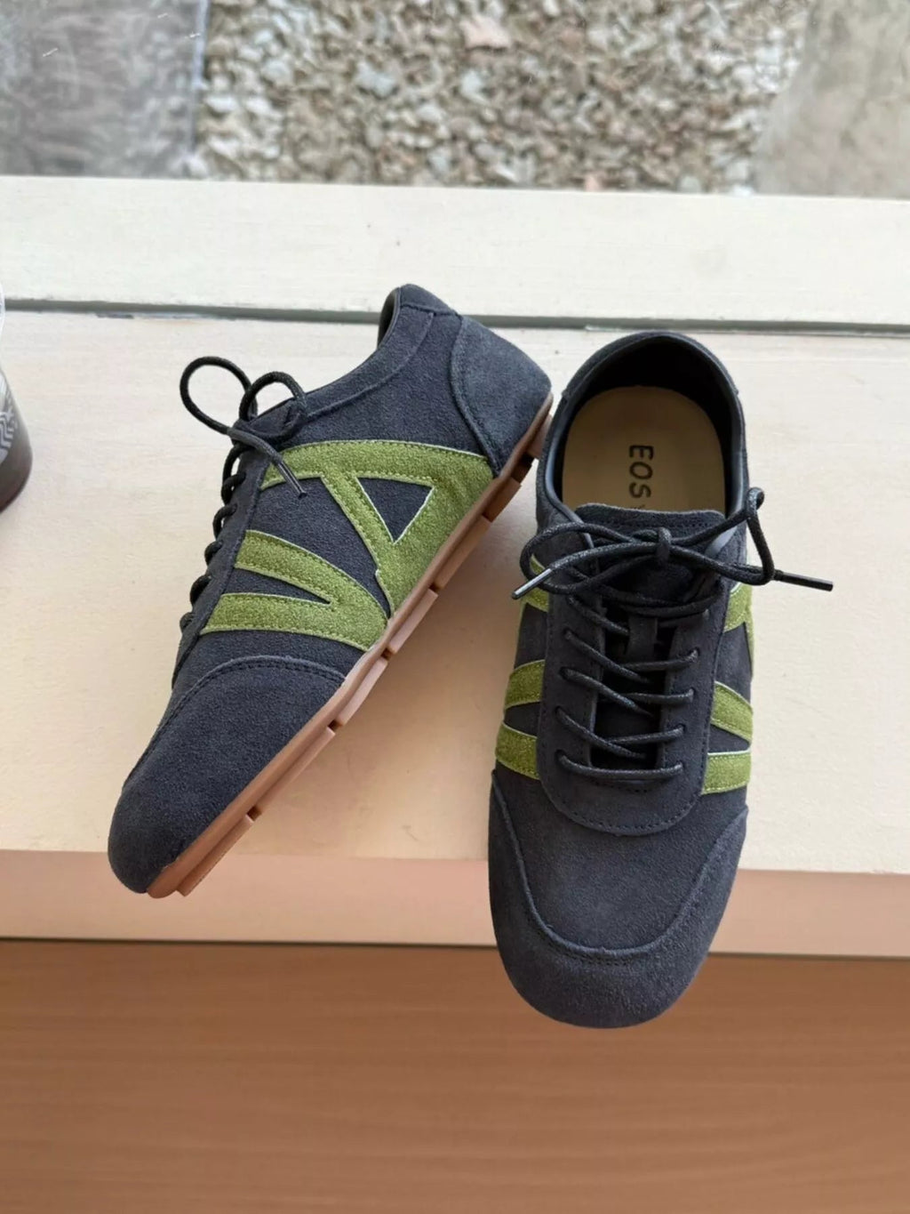 Women's casual suede and nylon lace-up flat sneakers with rubber soles, featuring a stylish and comfortable design.