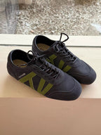 Women's casual suede and nylon lace-up flat sneakers with white soles, stylish and comfortable Trendsi shoe for everyday wear.