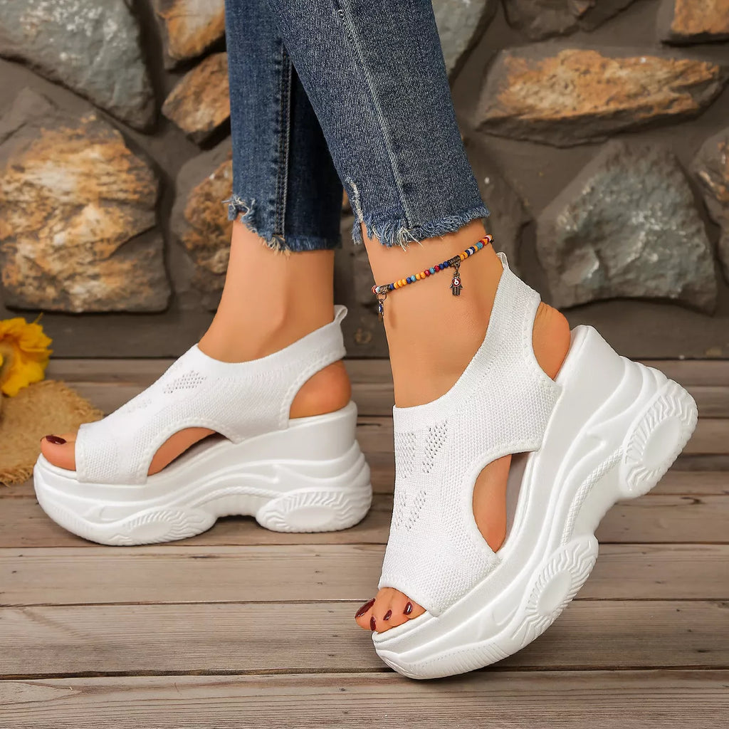 Open toe platform sandals by Plush Fashion Hub featuring a stylish design with a chunky heel and strappy details.