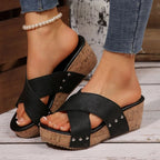 Women's faux leather crisscross open toe wedge sandals with comfortable summer design by Trendsi.